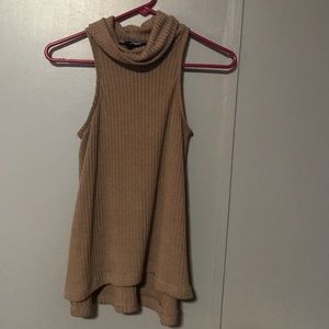 Turtle neck sleeveless blouse